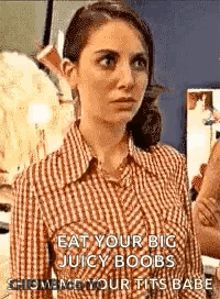 Woman In Plaid Shirt Talking To Mirror GIF