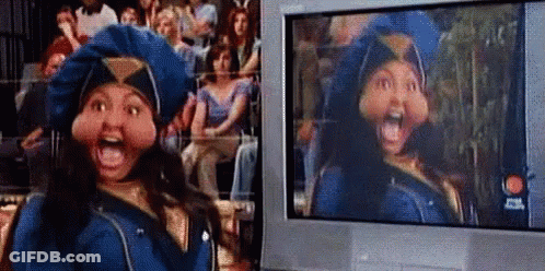 Woman In Police Uniform At Television Screen GIF