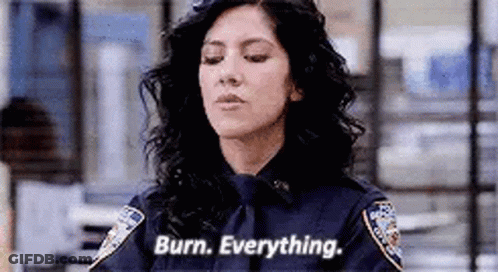 Woman In Police Uniform Saying Burn Everything GIF