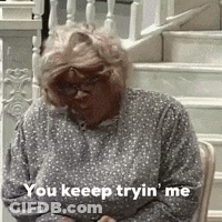 Woman In Polka Dot Shirt Sitting On Stairs GIF