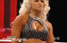 Woman In Polka Dot Top Standing In Ring GIF