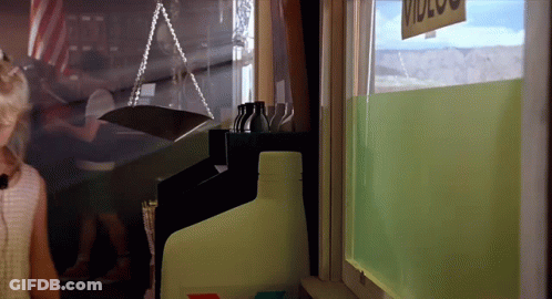 Woman In Ponytail Stands In Front Of Group In Restaurant GIF
