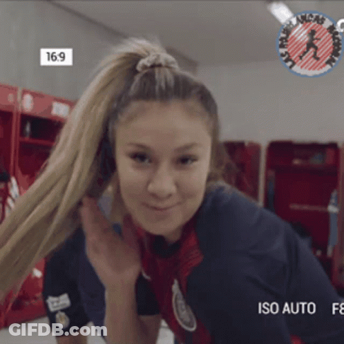Woman In Ponytail Wearing Iso Auto Jersey GIF