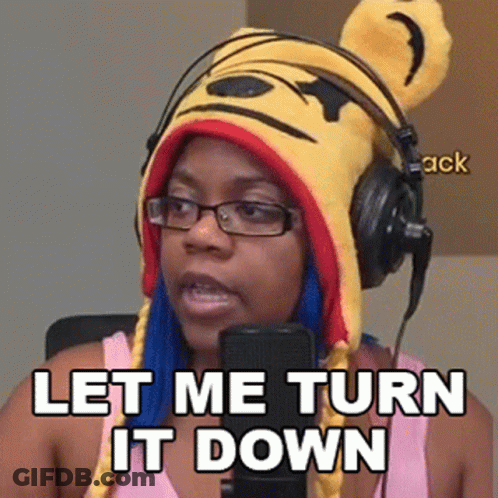 Woman In Pooh Hat And Headphones Saying Let Me Turn It Down GIF