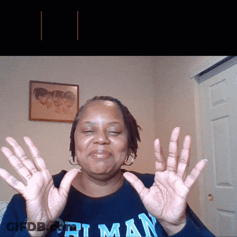 Woman In Priman Shirt Holding Hands Up GIF