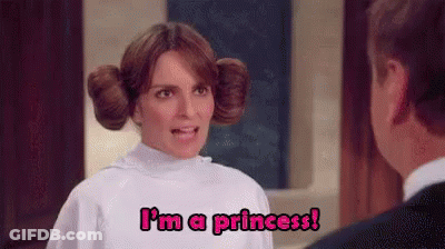 Woman In Princess Costume Talking To Man In Suit GIF