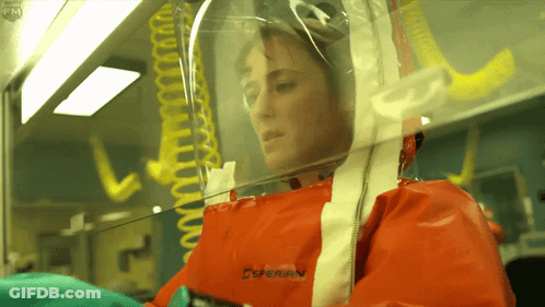 Woman In Protective Suit With Experian GIF