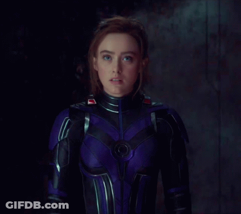 Woman In Purple And Black Superhero Costume GIF
