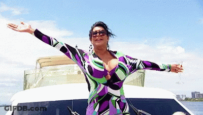 Woman In Purple And Green Dress On Boat GIF