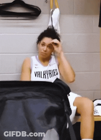 Woman In Purple And White Valkyries Tank Top GIF