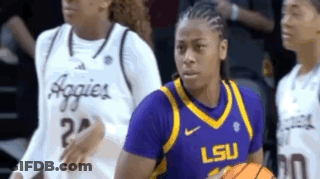 Woman In Purple And Yellow LSU Jersey Holding Basketball GIF