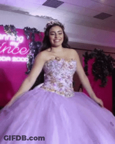 Woman In Purple Ball Gown Smiling GIF