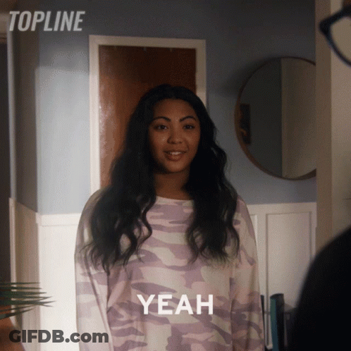 Woman In Purple Camo Sweater Says Yeah GIF