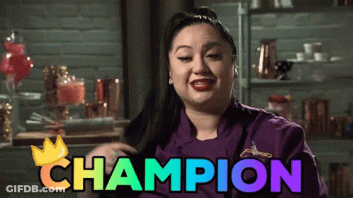 Woman In Purple Chef Coat Saying Champion GIF