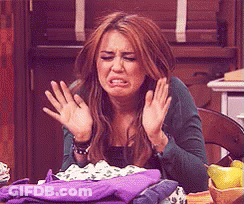 Woman In Purple Clothes Making Funny Face GIF