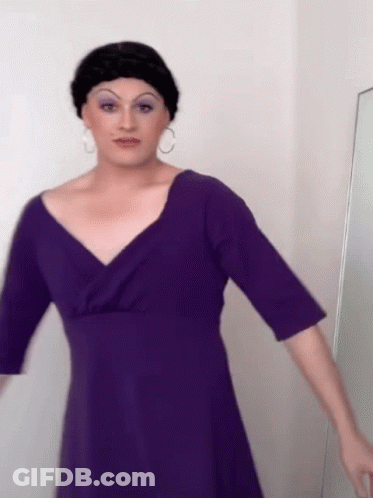 Woman In Purple Dress And Black Wig Mirror GIF