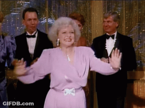 Woman In Purple Dress Before Tuxedo Group GIF