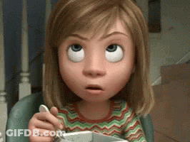 Woman In Purple Dress Blowing Out Birthday Candles GIF