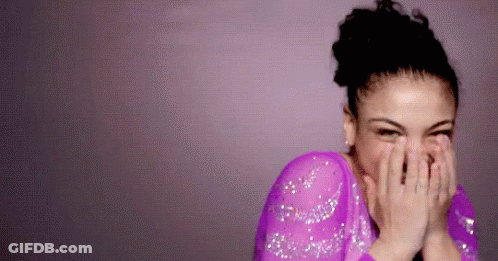 Woman In Purple Dress Covering Face Laughing GIF