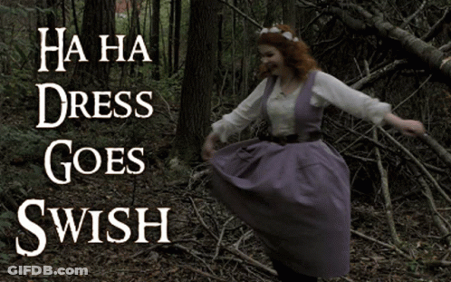 Woman In Purple Dress Dancing In Woods Saying Ha Ha Dress Goes Swish GIF