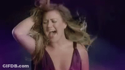 Woman In Purple Dress Dancing GIF