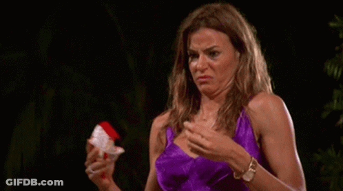 Woman In Purple Dress Making Funny Face Holding Paper GIF