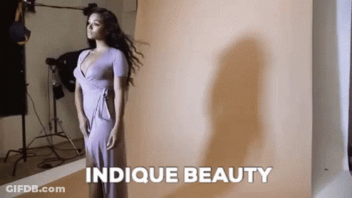 Woman In Purple Dress Posing GIF