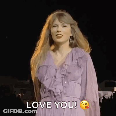 Woman In Purple Dress Saying Love You GIF
