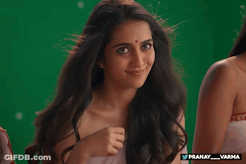 Woman In Purple Dress Smiling GIF
