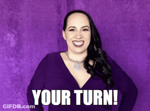Woman In Purple Dress Smiling Your Turn GIF