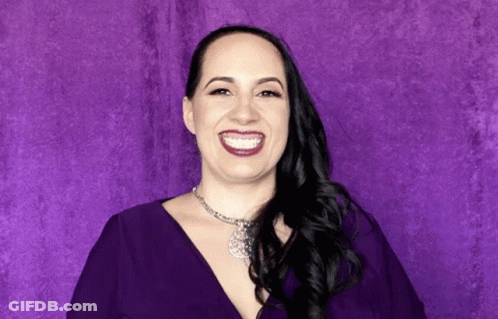 Woman In Purple Dress Smiling GIF