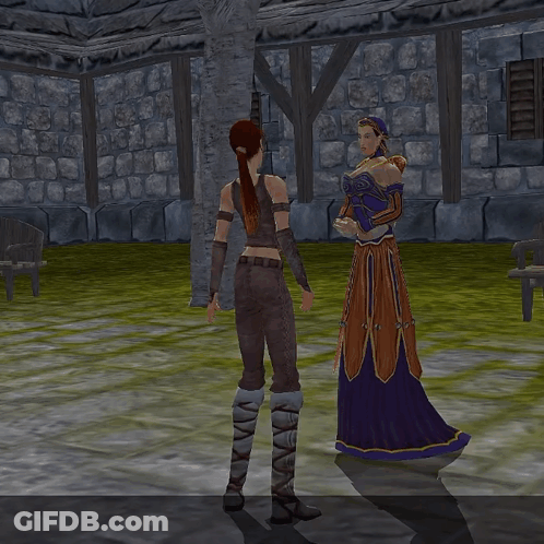 Woman In Purple Dress Standing Next To Woman GIF