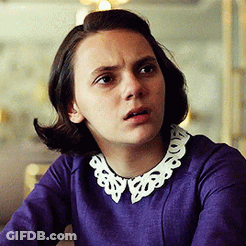 Woman In Purple Dress With White Collar GIF