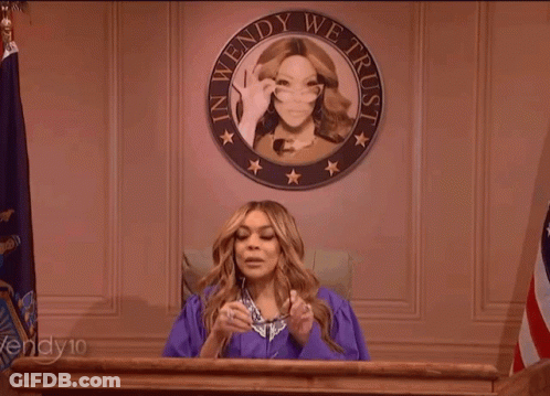 Woman In Purple Gown At Podium With Seal Saying In Wendy We Trust GIF