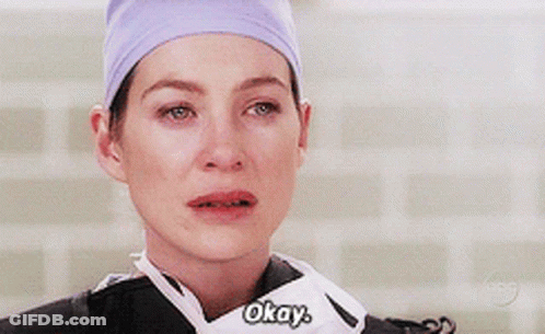 Woman In Purple Hat Saying Okay GIF