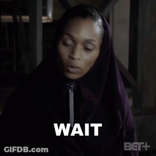 Woman In Purple Hooded Cape Saying Just Wait GIF