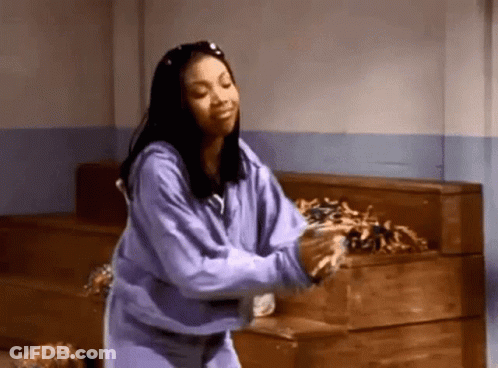 Woman In Purple Hoodie Dancing With Cheerleaders GIF