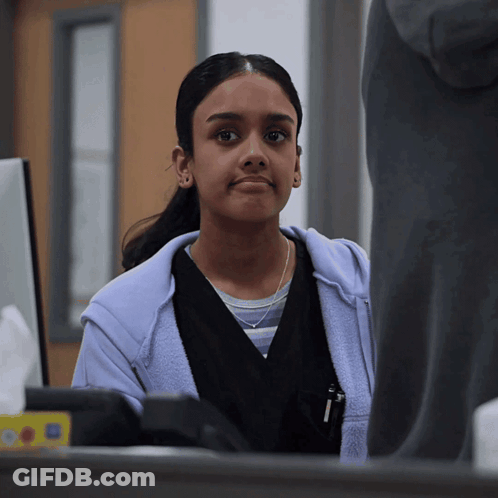 Woman In Purple Hoodie In Front Of Computer GIF