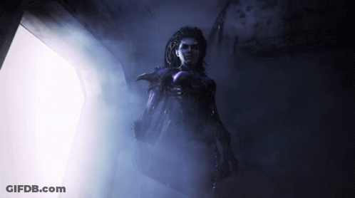 Woman In Purple In Dark Hallway GIF