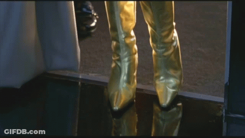 Woman In Purple Jacket And Gloves GIF