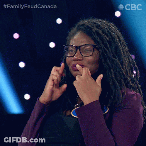 Woman In Purple Jacket Making Gesture GIF