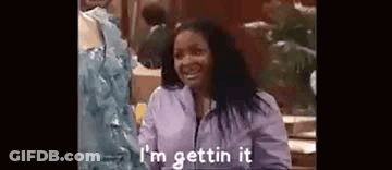 Woman In Purple Jacket Smiling Saying I'm Gettin' It GIF