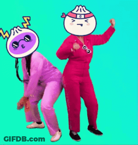 Woman In Purple Pants And Man In Red Pants Dancing GIF