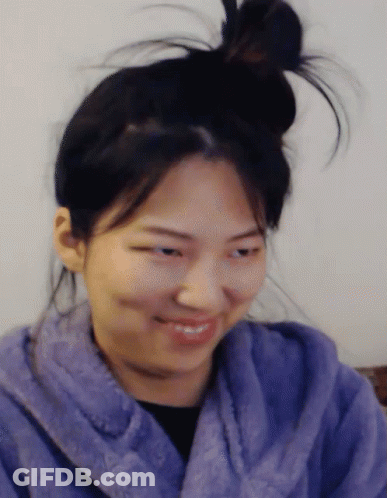 Woman In Purple Robe And Messy Bun GIF
