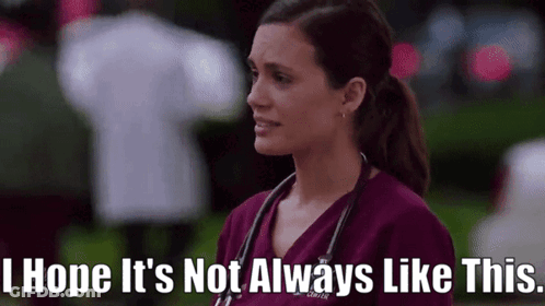 Woman In Purple Scrub Top With Stethoscope GIF