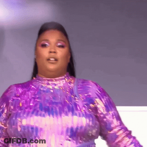 Woman In Purple Sequined Dress On Stage GIF