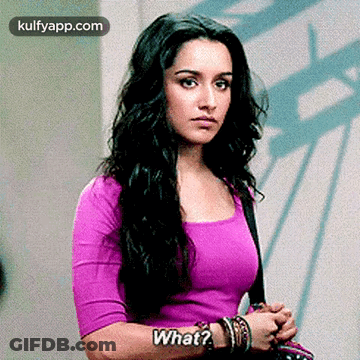 Woman In Purple Shirt Asking What GIF
