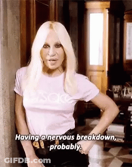 Woman In Purple Shirt Having Nervous Breakdown GIF