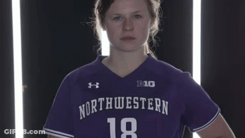 Woman In Purple Shirt Saying Northwestern Big GIF