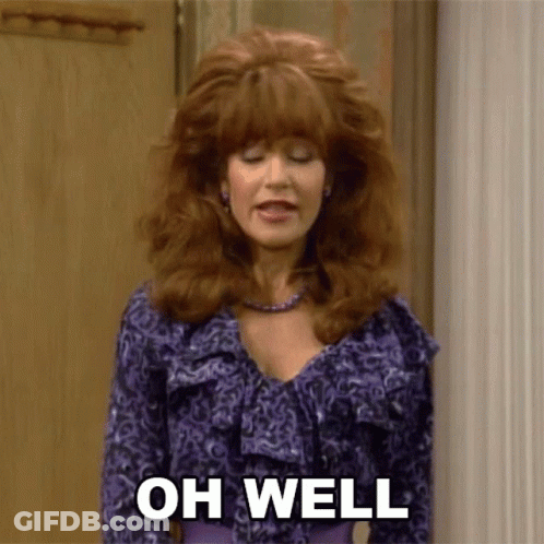 Woman In Purple Shirt Saying Oh Well GIF